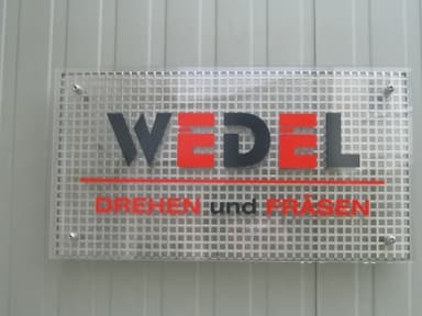 Eckhard Wedel mech. Werkstätte logo
